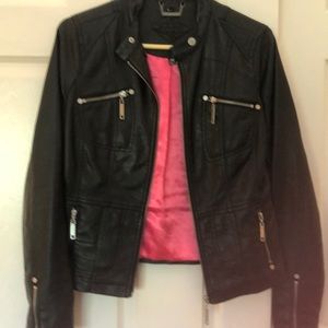Fun faux leather jacket with pink lining